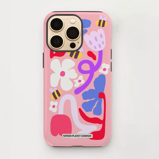 Pink phone case with colorful abstract designs on a light gray background