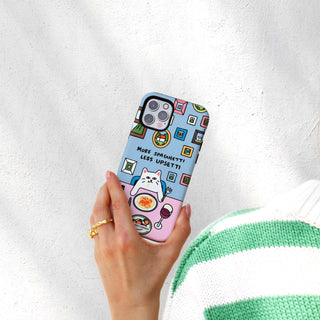Phone case with cartoon cat design held by a person against a white background