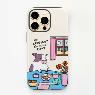 Phone case with a cow at a table and text on a white background