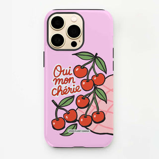Phone case with cherry design and text on a pink background