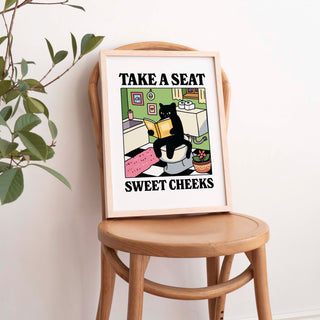 'Please take a seat Sweet Cheeks' Green Cat Print