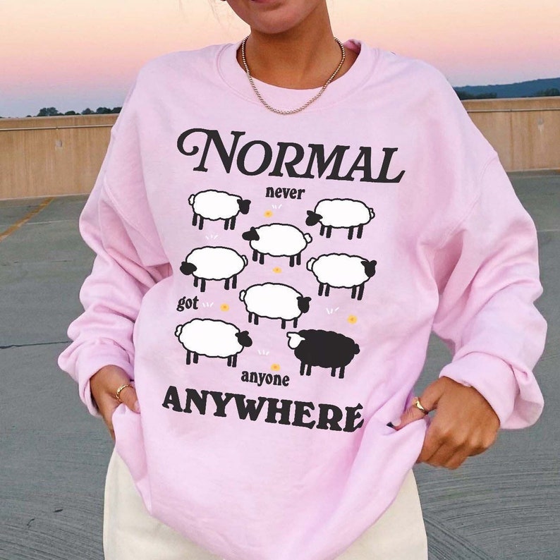 'Normal never got anyone anywhere' Sheep Sweatshirt