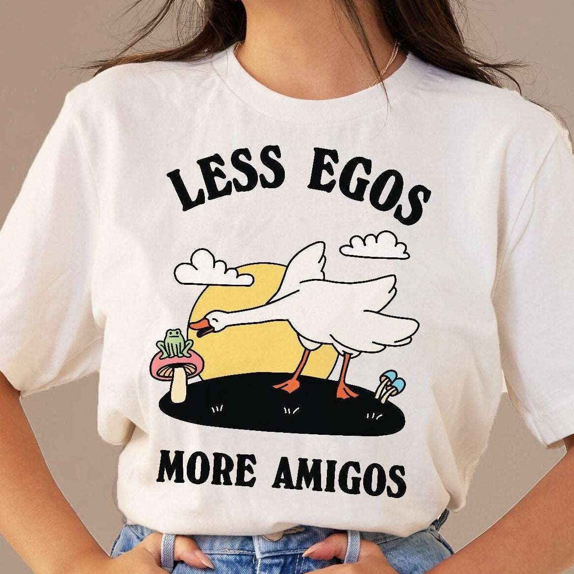 'More Egos Less Amigos' Frog And Goose Tshirt - T-shirts - Kinder Planet Company