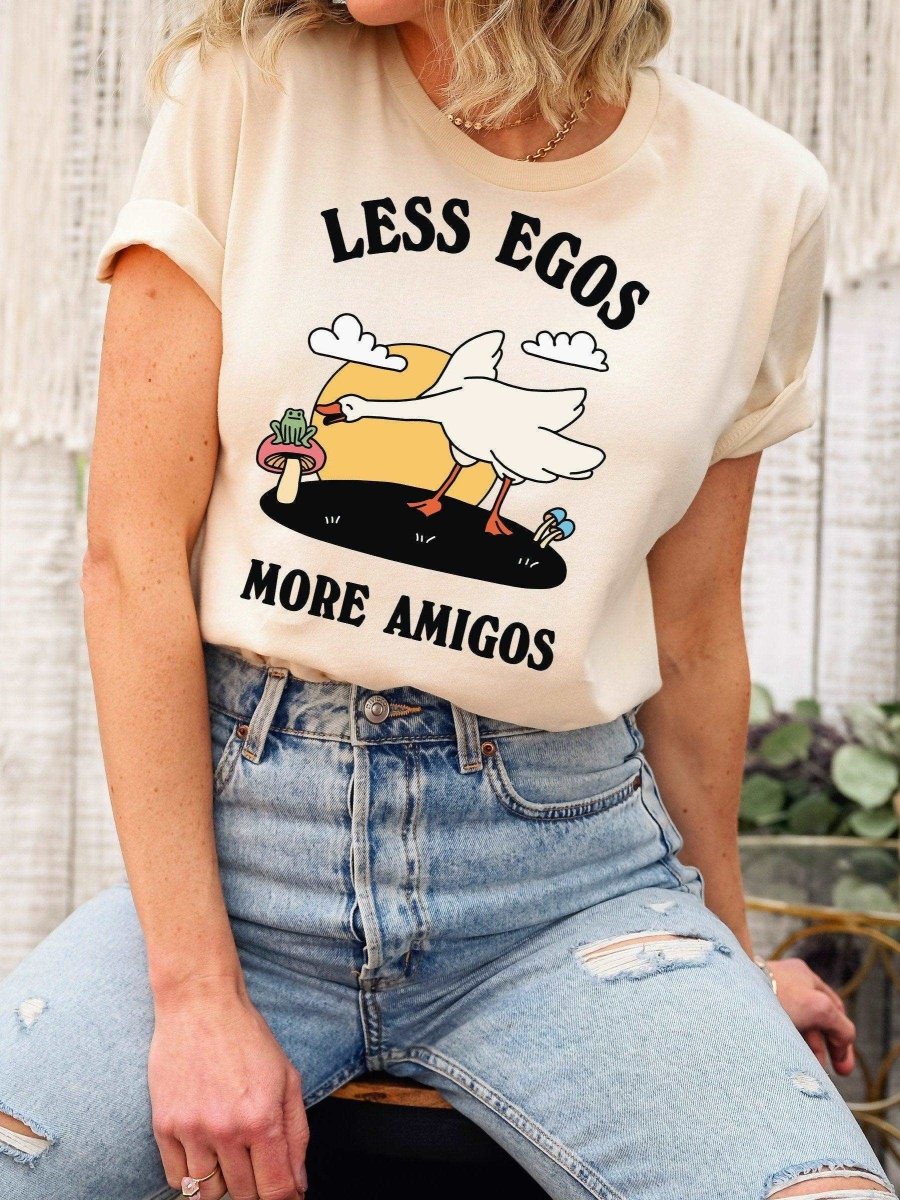 'More Egos Less Amigos' Frog And Goose Tshirt - T-shirts - Kinder Planet Company